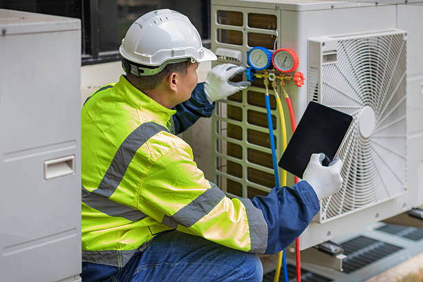 Professional Air Conditioning Repair technician working in Weatherby, MO